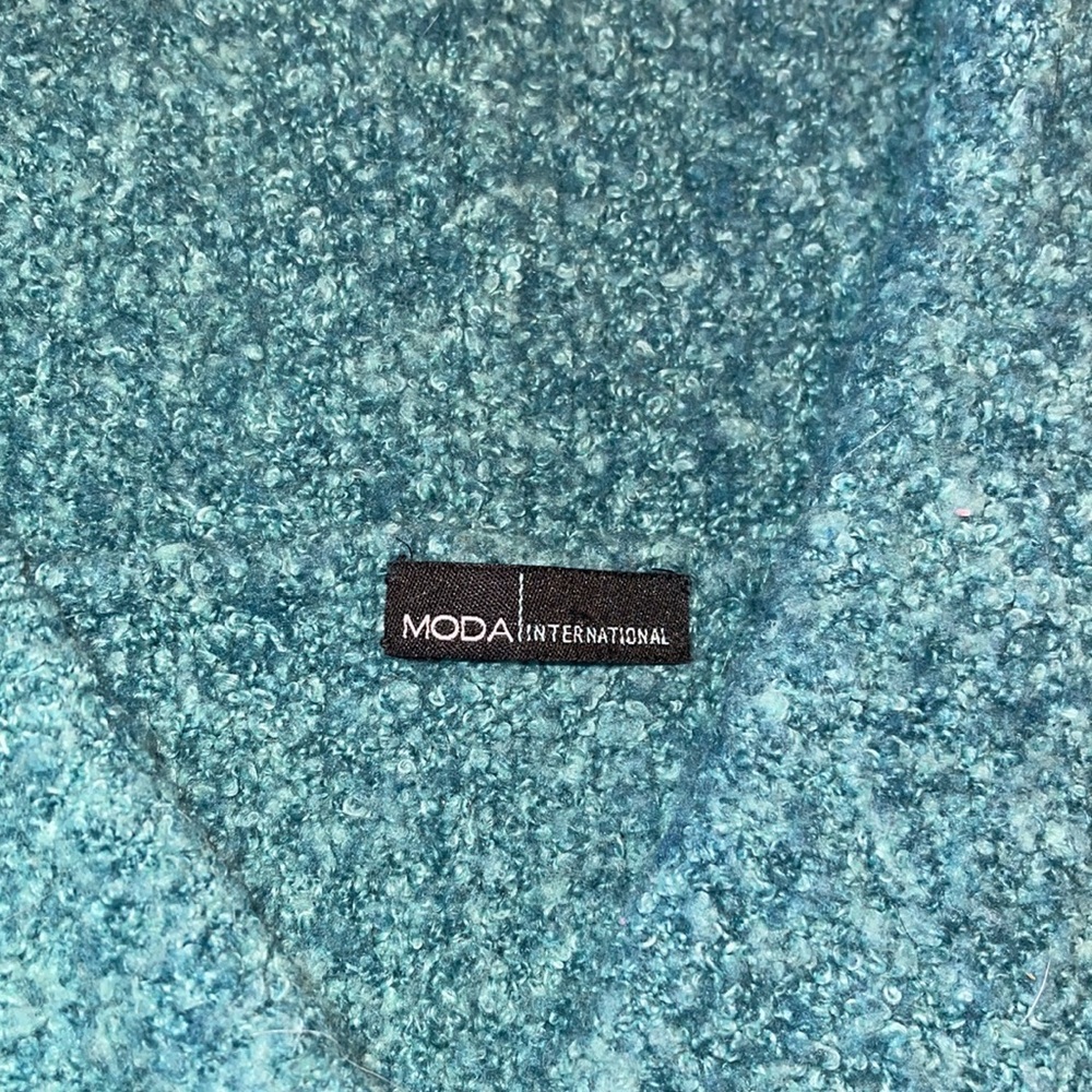 Super cute sweater color is greenish blue dark turquoise color. - Picture 2 of 6
